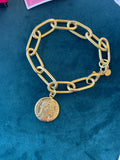 Bracciale maglia larga e moneta