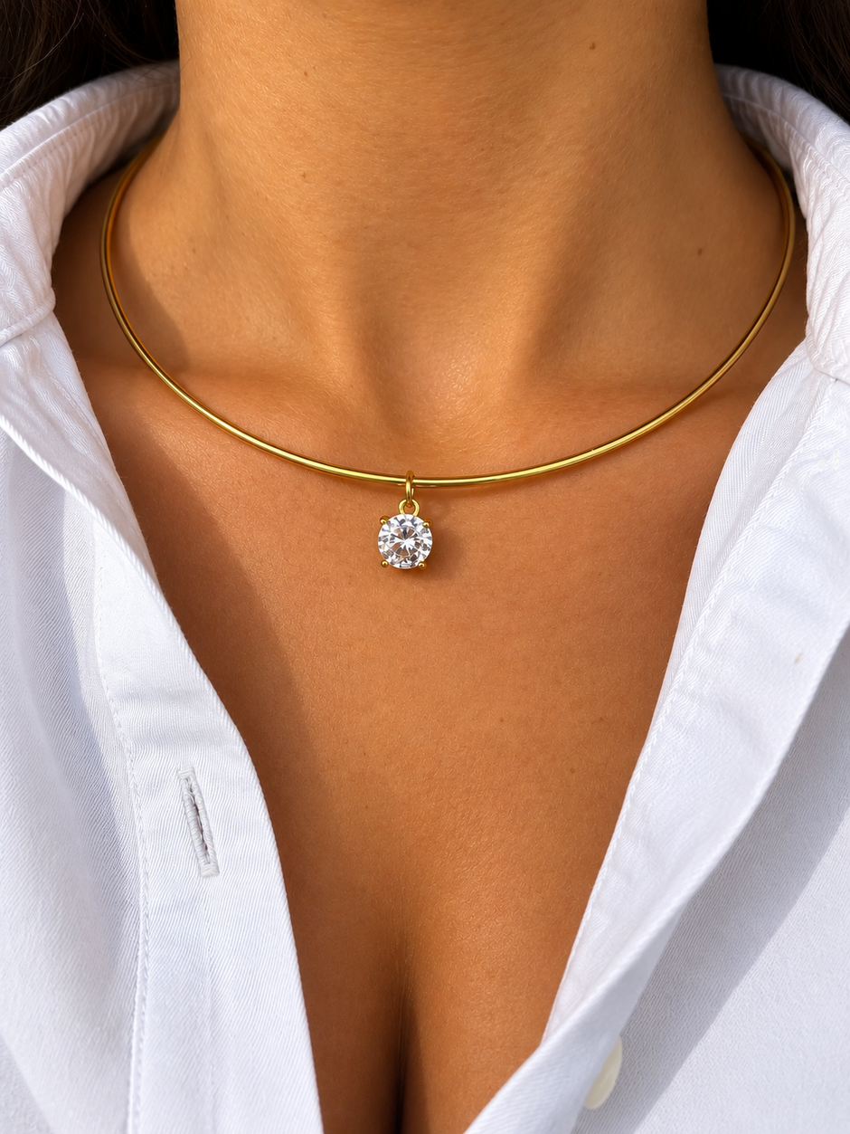 Collana rigida con punto luce